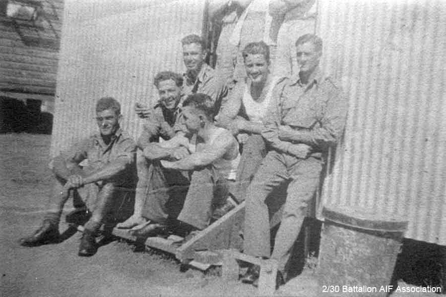 D Company, 16 Platoon
A group of 16 Platoon on the steps of a hut at Bathurst.

Left to right:

Back row:
1) NX36524 - CHARLESWORTH, Athol McNeil, Pte. - D Company, 16 Platoon 
2) NX45594 - ANNAND, Charles, L/Sgt. - D Company, 16 Platoon 
3) ? - DANIELS, Wimpy

Front row:
1) NX47814 - THOMPSON, George Edward, Pte. - D Company, 16 Platoon 
2) NX46136 - SPEERS, James Alexander (Jim), Pte. - D Company, 16 Platoon 
3) NX36521 - PERRY, Leslie George (Les), Pte. - D Company, 16 Platoon 

