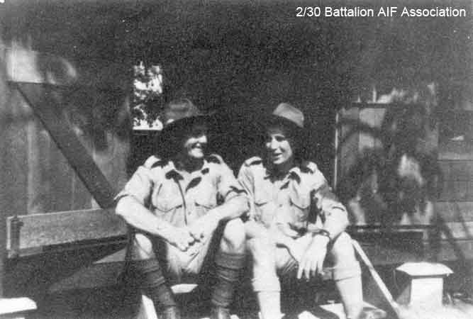 Birdwood Camp, Singapore
"Ted Campbell and Norm Grist, August 1941, shortly after our arrival."

Left to right:
1) NX36660 - GRIST, Norman Sydney, Pte. - D Company, 17 Platoon
2) NX36677 - CAMPBELL, Edward Stewart (Ted), Pte. - HQ Company, Carrier Platoon
