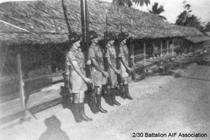 Birdwood Camp
B Company on guard duty at Birdwood Camp, August 1941.

Left to right:
1) NX59138 - SULLIVAN, Francis Michael (Sully or Frank), A/Cpl. - B Company, 10 Platoon
2) ?
3) ?
4) ?

