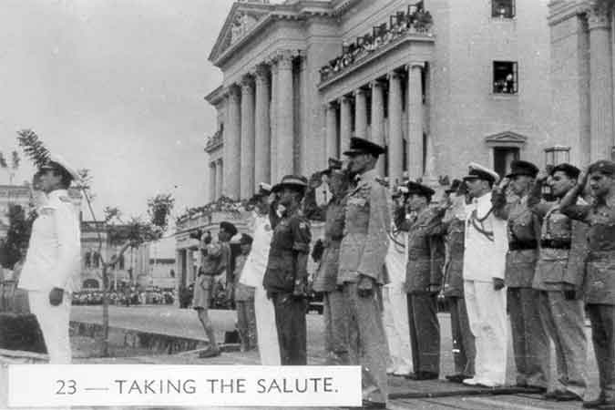 023 - Taking the salute
Lord Louis Mountbatten and senior Officeres outside the Singapore Municipal Buildings during the Japanese surrender ceremony. 
