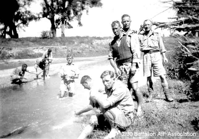 Training in Bathurst
Some of "A" Company, 9 Platoon.

Left to right:
1) NX46443 - McFARLANE, Cyril Keith (Keith), Pte. - A Company, 9 Platoon (standing in the river)
2) (sitting side on to camera)
3) (sitting facing camera)
4) 
5) NX31047 - O'CONNELL, James (James Patrick) (Paddy or Jim), Pte. - A Company, 9 Platoon
6) NX31528 - JOHNSON, Allan Alfred (Ack Ack), Pte. - HQ Company, Signals Platoon
Keywords: Makan264