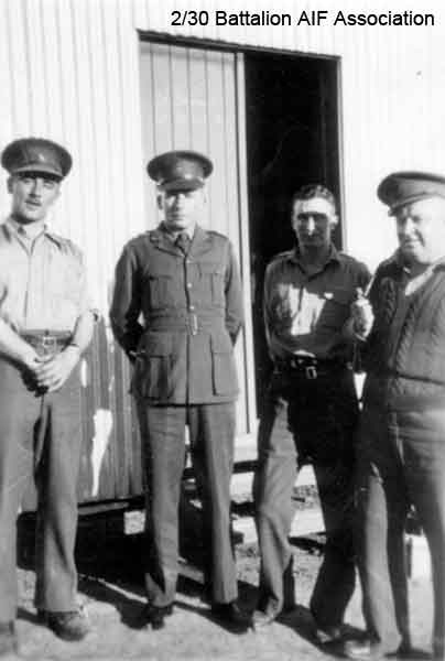 Training in Bathurst
Getting together outside the a barracks hut at Bathurst.

Left to right:
1)
2) NX30914 - BROWN, Gordon Victor (Doover), Lt. - A Company, O/C 7 Platoon
3) NX33631 - BEALE, Edward Ernest (Ted), Lt. - C Company, O/C 13 Platoon
4)
