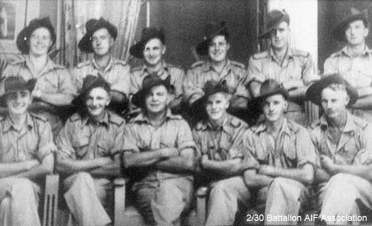 D Company, 18 Platoon
Some of 18 Platoon "D" Coy - Photo taken at Batu Pahat, Christmas 1941,.

The photo was taken by a commercial photographer at Batu Pahat, who operated under the name Ma Lee. He showed up later in Singapore as a Japanese officer. Spies and fifth columnists were everywhere.

Left to right:

Back row:
1) NX2536 - UPCROFT, Ernest Bruce (Bruce), Pte. - D Company, 18 Platoon
2) NX60594 - STUART, Lloyd Thomas, Pte. - D Company, 18 Platoon
3) NX47833 - WEST, Jack Sydney (Jackie), Pte. - D Company, 18 Platoon
4) NX47505 - MORGAN, Gordon Russell (Tommy), Pte. - D Company, 18 Platoon
5) NX51831 - GALBRAITH, William Martin (Bill), Pte. - D Company, 18 Platoon
6) NX51660 - CAREY, John Peter (Jack), Pte. - D Company, 18 Platoon

Front row:
1) NX37732 - PHILLIPS, Ernest William (Ernie), Pte. - D Company, 18 Platoon
2) NX47685 - WELLS, Robert Frederick (Hook or Bob), Pte. - D Company, 18 Platoon
3) NX47597 - HOGAN, Martin Leo (Leo), Pte. - D Company, 18 Platoon
4) NX47761 - JONES, Baden Stanley (Sluggo), Pte. - D Company, 18 Platoon
5) NX10661 - CAREY, Luke Robert, Pte. - HQ Company, Mortar Platoon
6) NX47750 - BRACE, Albert Ernest (Snowy), Pte. - D Company, 18 Platoon 
