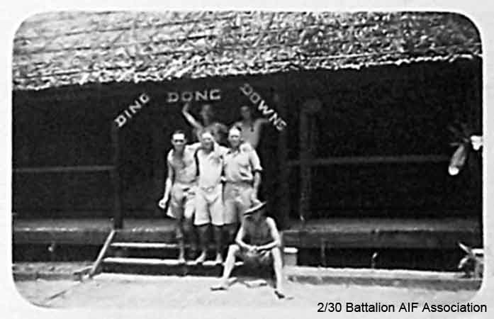 Ding Dong Downs, Batu Pahat
"D" Company Orderly Room, Batu Pahat. Known as "Ding Dong Downs".

Left to right:

Back row:
1) NX41262 - HICKSON, Brian Murray Prior, Cpl. - D Company, 18 Platoon
2) NX37529 - CURRAN, Maxwell William (Snake), Pte. - D Company, 16 Platoon

Middle row:
1) NX54877 - WEBSTER, Leslie, Pte. - D Company or NX36533 - WEBSTER, Sidney Linden, Pte. - D Company
2) NX41230 - GOLLEDGE, Robert Charles (Red or Charlie), Cpl. - D Company, 18 Platoon
3) NX47890 - CAMPBELL, Alexander, Pte. - D Company

Front row (seated):
1) NX41360 - WHITE (Rhodes-White), Robert Rhodes (Robert), Cpl. - D Company, 18 Platoon
