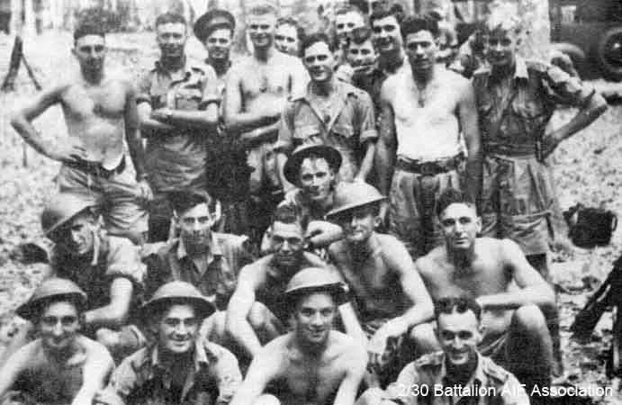 B Company, 10 Platoon
Training in Malaya.

Left to right:

Back row (standing at rear, partly obscured):
1) NX46067 - CRUMMY, Stanley Arthur Kevin (Nugget), Pte. - HQ Company, Transport Platoon 
2) NX31694 - CANN, Basil Arthur (Dan), Pte. - B Company, 12 Platoon
3) NX32594 - GEIKIE, Nugent Broun Coulston, Lt. - B Company, O/C 10 Platoon
4) NX37442 - COOMBES, Thomas Joseph (Paddy or Tom), Pte. - B Company, 10 Platoon
5) NX2715 - McWILLIAMS, Alexander George (Alex), Cpl. - B Company, Protective Platoon

Remainder standing:
1) NX4333 - DENHOLM, Alexander (Ike or Alex), Pte. - B Company, 10 Platoon
2) 
3) NX30417 - CHANEY, Robert Charles (Bob), Pte. - B Company, 10 Platoon
4) NX26539 - GOODWIN, John Arthur (Jack), Pte. - HQ Company, Mortar Platoon
5) NX30308 - BANCROFT, Ivan, Pte. - HQ Company, Carrier Platoon
6) NX47140 - DALTON, Ronald B. (Dolly or Ron), Pte. - B Company, 10 Platoon

3rd row (kneeling in front of Jack GOODWIN):
1) NX37485 - FERRY, Arnold Brendan (Arnie), L/Cpl. - B Company, 10 Platoon

2nd row (kneeling):
1) NX4396 - MURRAY, Robert Samuel (Mick), Pte. - B Company, 12 Platoon
2) NX26367 - SMITH, Allan Claude, Pte. - B Company, 10 Platoon
3) NX37482 - MICHELL, George Phillip, Pte. - B Company, 10 Platoon
4) NX20550 - McLEOD, Thomas Kennedy (Tom), A/Cpl. - B Company, 10 Platoon
5) NX37483 - MICHELL, Raymond John (Ray), A/Cpl. - B Company, 10 Platoon

Front row (sitting):
1) NX25845 - BUCKINGHAM, Arthur George, A/U/Cpl. - B Company, 10 Platoon
2) NX36588 - WARTON, Allen Charles, Pte. - B Company, 10 Platoon
3) NX37359 - FARLEY, Chumley Jack Henry (Chum), Pte. - B Company, Coy. HQ
4)  NX37456 - McNAMARA, William Patrick (Bill), Pte. - B Company, 10 Platoon
Keywords: Makan265