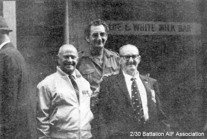 Anzac Day, Sydney, 1982
"'Zipper' Charlton and Jimmy Hill, with Jimmy's son-in-law. They asked George Aspinall to photgraph them together, a remembrance of their Boxing Match at Thomson Road, 1942."

Left to right:
1) NX26330 (NX5078) - CHARLTON, Ronald Alan (Zipper or Ron), Pte. - B Company, 12 Platoon
2) Jimmy Hill's son-in-law
3) NX34500 - HILL, James Oswald (Jimmy), Pte. - HQ Company, Pioneer Platoon
Keywords: Makan265 AnzacDay1982