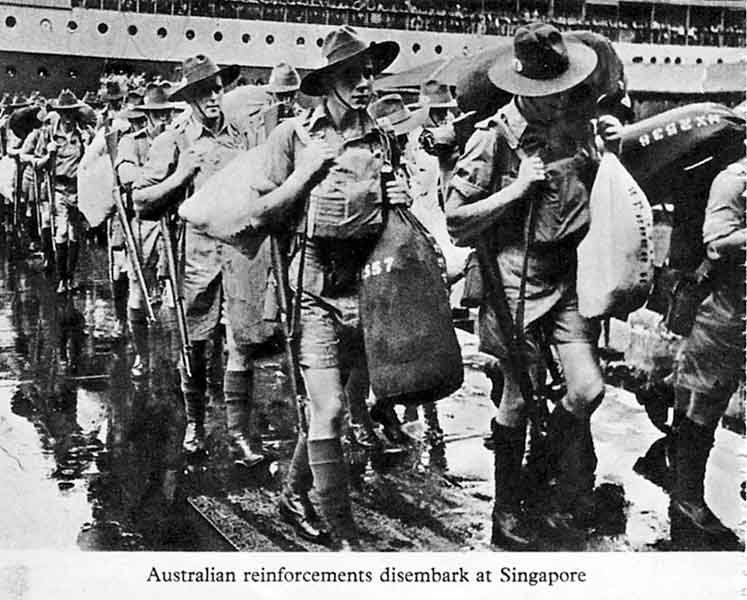 Arriving in Singapore
Members of "C" Company, 2/30 Battalion disembark at Singapore, from Johan Van Oldenbarnevelt (HMT FF), part of Convoy US11B.

First row - nearest to camera:
1) NX41357 - CAMERON, Alan Rentoul, Lt. - C Company, O/C 15 Platoon
2) NX2712 - WEBBER, Harry George, L/Cpl. - C Company, 15 Platoon (with pack on left shoulder)
3) NX2538 - JOHNSTON, Ronald Athol (Ron), Cpl. - C Company, 14 Platoon 
Keywords: 070723a Johan