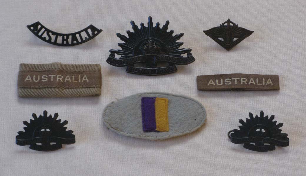 Various Insignia
Includes 2/30 Battalion colour patch, Rising Sun badges, and shoulder badges.
Keywords: 100214c NX32306