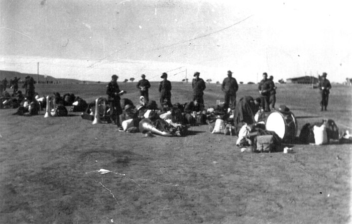 2/30 Battalion Band
The 2/30 Battalion Band having a rest at Bathurst Army Camp in 1941.
Keywords: 100216a