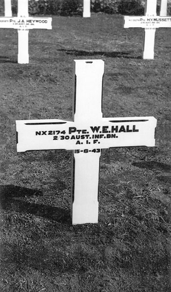 NX2174 - HALL, Walter Edward (Legs), Pte. - B Company, 10 Platoon 
The original headstone on the grave of "Legs" Hall.

He was killed accidently (fractured skull) while POW in Kobe Japan. He died of his injuries on 15/8/1943, and was cremated. His ashes were interred in Juganji Temple, Osaka. The urn was transferred to the USAF Mausoleum, Yokohama, and then his ashes were laid to rest in Yokoham Cemetery on 4/12/1945.

Yokohama Cemetery, Australian Section, Grave B.B.9

NX2174 PTE. W.E. HALL
2/30 AUST. INF. BN.
A.I.F.

15-8-43
Keywords: 20101027a