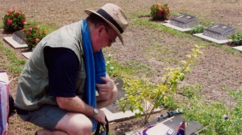 Thanbyuzayat War Cemetery
Jim Busine, beside his father's grave at Thanbyuzayat Cemetery

NX77799 - BUSINE, Sydney Herbert Thomas, Pte.
Keywords: 20120830a
