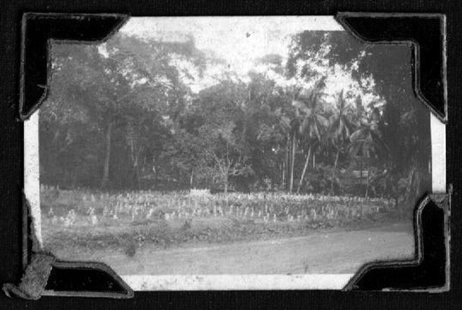Training in Malaya
Street scene in Malaya. Possibly a Chinese cemetery.

From photo album containing photos of:
NX65871 - ALLARDICE, Stephen Russell (Steve), Sgt. - HQ Coy. HQ. Transport Platoon
Keywords: 20131219a