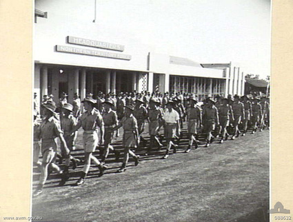 HQ Northern Territory Force
AWM caption reads:
DARWIN, NORTHERN TERRITORY. 1945-04-04. TROOPS LEADING THE MARCH PAST. THE SALUTE WAS TAKEN BY MAJOR-GENERAL J.J. MURRAY, GOC HEADQUARTERS NORTHERN TERRITORY FORCE.

2/30 Battalion Association notes:
NP5862 (NX150879) - Pte. Levis Frederick (Cappy) BLIGH was attached as the Armourer to the 2/30 Battalion at Tamworth, NSW in 1940. He eventually transferred to the AIF (Army Number NX150879) and after service in New Guinea, was posted as Sergeant to HQ NT Force. He was discharged on 15/7/1948.


Keywords: 100102b