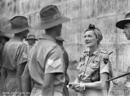 Lady MOUNTBATTEN and Black Jack GALLEGHAN
Australian War Memorial caption reads:
SINGAPORE, STRAITS SETTLEMENTS, 1945-09-14. LADY EDWINA MOUNTBATTEN, SUPERINTENDENT IN CHIEF. THE ST. JOHN AMBULANCE BRIGADE, WIFE OF THE SUPREME ALLIED COMMANDER, SOUTH EAST ASIA, CHATTING WITH SGT W. EATHER, 2/30TH AUSTRALIAN INFANTRY BATTALION DURING AN INSPECTION OF THE EX-PRISONERS OF WAR OF THE JAPANESE AT THE CHANGI GAOL.

Left to right:
1) unknown (back to camera)
2) NX41134 - EATHER, Walter Barnett, Sgt. - C Company, 15 Platoon; also 13 Platoon and A/A Platoon
3) Lady Edwina MOUNTBATTEN
4) NX70416 - GALLEGHAN (Sir), Frederick Gallagher (Black Jack), Brig. - BHQ. CO. 2/30 Bn. D.S.O., O.B.E., I.S.O., E.D., K.B.
Keywords: 100105c