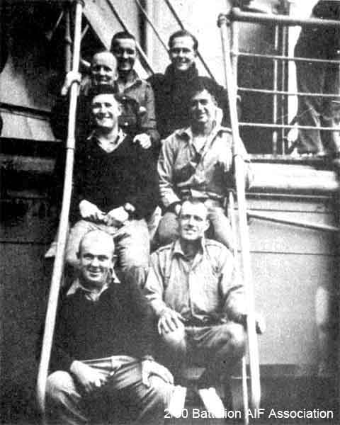 On the way to Singapore
On the boat to Singapore, July 1941.

Left to Right (from back row): Ken Lindsay, Keith Wrigley, Charlie Annand, Bruce Campbell, Bob McLaren, John Williams and Dudley Bale.

1) NX45773 - LINDSAY, Kenneth William (Ken), L/Sgt. - D Company, Ord. Room
2) NX30608 - WRIGLEY, Keith Hastings, Pte. - 2/10 Field Ambulance
3) NX45594 - ANNAND, Charles (Charlie), L/Sgt. - D Company, 16 Platoon
4) NX47284 - CAMPBELL, Robert Bruce (Bruce), Pte. - HQ Company, Transport Platoon
5) NX47369 - McLAREN, Robert Ernest (Bob), Pte. - D Company, 18 Platoon
6) ? - WILLIAMS, John
7) NX37431 - BALE, Dudley William (Schnapper), Gnr. - B Company
Keywords: Makan246