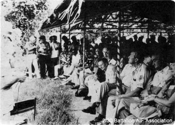 1979 Tour, Day 04
Gemencheh Bridge 14/1/1979 - gathering under marquee, which had been lent by Negri Sembilan Government with ex-Servicemen from Seramban and some 3 to 400 of gathering all told, holding Commemoration Ceremony.

Included in the report of the 2/30 Bn Group Tour to Malaysia and Singapore. See details in [url=http://www.230battalion.org.au/Makan/Issues/Makan248.htm#Day04]Makan 248, Day 4, 14/1/1979.[/url]
Keywords: Makan248