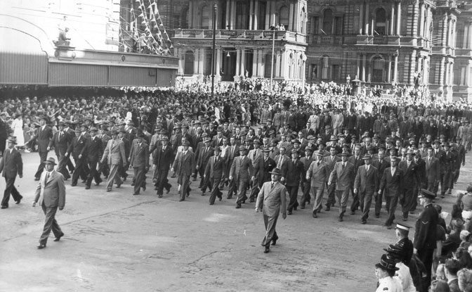 Anzac Day, Sydney, 1947
The men leading the march are:

1) NX34999 - RAMSAY, George Ernest (Gentleman George), Lt. Col. - BHQ, CO. 1942
2) NX70416 - GALLEGHAN (Sir), Frederick Gallagher (Black Jack), Brig. - BHQ. CO. 2/30 Bn. D.S.O., O.B.E., I.S.O., E.D., K.B.
3) NX70427 - JOHNSTON, Noel McGuffie (Charlie Chan), Lt. Col. - BHQ, 2 I/C Bn.
Keywords: AnzacDay1947