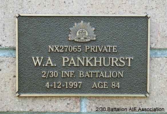 NX27065 - PANKHURST, William Ashley, Pte. - C Company, 15 Platoon
View of the bronze plaque erected in the NSW Garden of Remembrance on Wall 31, Row F. The garden is adjacent to Sydney War Cemetery at the Rookwood Necropolis, and is maintained by The Office of Australian War Graves.

The plaques are provided by The Office of Australian War Graves to commemorate eligible veterans who have died post war and whose deaths are accepted as being caused by war service. This form of commemoration is used when there is a private memorial elesewhere, or for some reason, the Office is unable to provide an official memorial at the relevant Cemetery or Crematorium.
