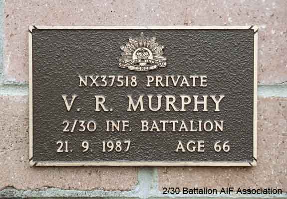 NX37518 - MURPHY, Victor Roy (Vic), Pte. - A Company
View of the bronze plaque erected in the NSW Garden of Remembrance on Wall 20, Row A. The garden is adjacent to Sydney War Cemetery at the Rookwood Necropolis, and is maintained by The Office of Australian War Graves.

The plaques are provided by The Office of Australian War Graves to commemorate eligible veterans who have died post war and whose deaths are accepted as being caused by war service. This form of commemoration is used when there is a private memorial elesewhere, or for some reason, the Office is unable to provide an official memorial at the relevant Cemetery or Crematorium.
