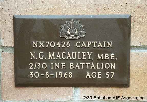 NX70426 - MACAULEY, Norman Gilmour (Red), Capt. - HQ Company, O/C Tpt. Platoon
View of the bronze plaque erected in the NSW Garden of Remembrance on Wall 10, Row F. The garden is adjacent to Sydney War Cemetery at the Rookwood Necropolis, and is maintained by The Office of Australian War Graves.

The plaques are provided by The Office of Australian War Graves to commemorate eligible veterans who have died post war and whose deaths are accepted as being caused by war service. This form of commemoration is used when there is a private memorial elesewhere, or for some reason, the Office is unable to provide an official memorial at the relevant Cemetery or Crematorium.
