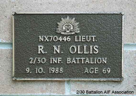 NX70446 - OLLIS, Ronald Nesbitt, Lt. - D Company, O/C 17 Platoon
View of the bronze plaque erected in the NSW Garden of Remembrance on Wall 59, Row B. The garden is adjacent to Sydney War Cemetery at the Rookwood Necropolis, and is maintained by The Office of Australian War Graves.

The plaques are provided by The Office of Australian War Graves to commemorate eligible veterans who have died post war and whose deaths are accepted as being caused by war service. This form of commemoration is used when there is a private memorial elesewhere, or for some reason, the Office is unable to provide an official memorial at the relevant Cemetery or Crematorium.
