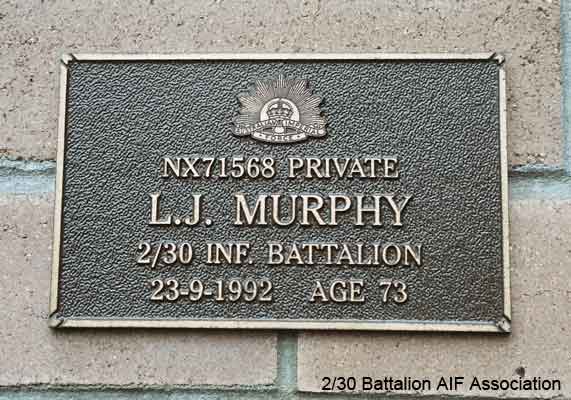 NX71568 - MURPHY, Leo James, Pte. - A Company, 9 Platoon
View of the bronze plaque erected in the NSW Garden of Remembrance on Wall 19, Row G. The garden is adjacent to Sydney War Cemetery at the Rookwood Necropolis, and is maintained by The Office of Australian War Graves.

The plaques are provided by The Office of Australian War Graves to commemorate eligible veterans who have died post war and whose deaths are accepted as being caused by war service. This form of commemoration is used when there is a private memorial elesewhere, or for some reason, the Office is unable to provide an official memorial at the relevant Cemetery or Crematorium.
