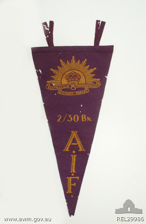 Souvenir pennant of 2/30 Battalion, AIF
Australian War Memorial caption reads:
Associated with NX3971 G C Quinn who served with the 2/30 Battalion. Quinn was captured by the Japanese after the fall of Singapore and became a prisoner of war, first in Thailand and then in Japan. During his internment it was necessary to amputate one of his legs. He was possibly also known as Reginald George Quinton.

NX37544 - QUINTON, Reginald George, Pte. - BHQ. D&P Platoon.
Right leg amputated below knee, 7/7/1944; recovered from Japanese in Thailand on 20/8/1945; emplaned Singapore on 6/10/1945 for return to Australia; arrived Melbourne 8/10/1945; then by train to Sydney, arrived 9/10/1945
Keywords: 100105c
