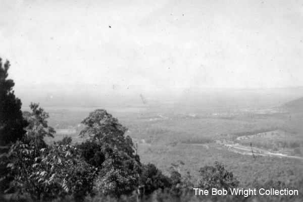 Near Batu Pahat
"A view from near our new camp. Notice all the jungle."

1. The photographs are to be known as The Bob Wright Collection.
2. Reproduction of the Collection or any part of it is prohibited without written permission.
3. Permission is granted to the 2/30th Batallion Association to reproduce the Collection as it deems appropriate.
4. Permission is granted to the Australian War Memorial Museum to reproduce the Collection as it deems appropriate.
5. All other permission is specifically withheld.
6. Written application for permission to reproduce the Collection, or part of it, may be made to:
Mr I. Wright
95 Hewitt Avenue
Wahroonga 2076 New South Wales

