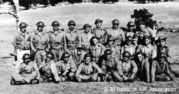 Mortar Platoon at Bathurst, 1941
The Mortar Platoon in training at Bathurst, shortly before embarkation for Malaya.

Front row, left to right:
1) NX27259 - BLADWELL, Frederick Joseph, Sgt. - HQ Company, Mortar Platoon
2) NX54474 - STEVENS, Francis Rupert Brotherson (Snowy), Pte. - HQ Company, Mortar Platoon
3) NX31365 - McHUGH, Michael John (Mick), Pte. - HQ Company, Mortar Platoon
4) NX54467 - STONE, Eric William, Cpl. - HQ Company, Mortar Platoon
5) NX32900 - SMITH, Reginald (Butch), Pte. - HQ Company, Mortar Platoon
6) NX32306 - MACIVER, Donald Gunn (Bluey), Cpl. - HQ Company, Mortar Platoon
7) NX24089 - HARRIS, John Evan (Scotty/Cock), Cpl. - HQ Company, Mortar Platoon
8) NX58187 - BARNS, Victor, L/Sgt. - HQ Company, Mortar Platoon

Middle row, left to right:
1) NX50446 - WALSHE, James Prior (Splinter), Pte. - HQ Company, Mortar Platoon
2) NX65999 - BLOW, Ernest John Stewart (Stew), Sgt. - HQ Company, Mortar Platoon
3) NX45847 - EVERINGHAM, Albert Clemen (Clem), L/Sgt. - HQ Company, Mortar Platoon
4) NX57292 - OWEN, Campbell Dunlop (Blue), Pte. - HQ Company, Mortar Platoon
5) NX47592 - WALLWORK, Martin Russell, Pte. - HQ Company, Mortar Platoon

Back row, left to right:
1) NX58157 - GREENWOOD, Frederick John (Jack), Pte. - HQ Company, Mortar Platoon
2) NX46561 - COOK, Max, Pte. - HQ Company, Mortar Platoon
3) NX32019 - WILMOTT, Alexander John, Pte.
(enlisted as NX32019 - John Allan WILLMOTH on 13/6/1940; taken on strength with 2/30 Bn. at Tamworth on 22/11/1940; discharged in absentia on 3/9/1941; re-enlisted as NX78032 - Pte. Alexander John WILMOTT on 11/12/1941 and rejoined 2/30 Bn. on 26/1/1942)
4) NX54739 - TAPP, David Slader, Pte. - HQ Company, Mortar Platoon
5) NX70447 - KRECKLER, John Francis (Bib), Lt. - HQ Company, 2 I/c Mortar Platoon
6) NX46503 - TATE, David William, A/U/Sgt. - HQ Company, Mortar Platoon
7) NX41145 - LOVE, Sydney George, Pte. - HQ Company, Mortar Platoon
8) NX24909 - DU ROSS, Stanley Claude Melbourne (Frenchy), Sgt. - HQ Company, Mortar Platoon
9) NX15405 - McALISTER, Albert James (Abby), A/U/WO2 - HQ Company, A/CSM
