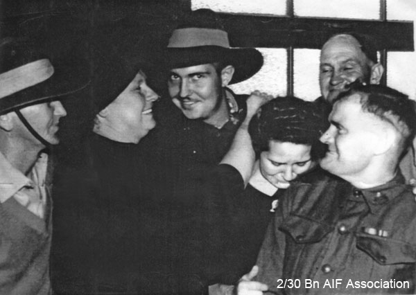 Return from War
Jack CONN returns to Australia, after disembarking from Esperance Bay, 9/10/1945.
Left to right:
1) N102346 - CONN, Lancelot Roy, Sgt. - 1 SRD (Uncle Lance)
2) Min CONN (Mother)
3) NX72575 - CONN, Edward John (Jack), Pte. - HQ Company, Signals Platoon
4) Dorothy SANSON
5) Noel CONN
6) ? - PIPER, Ernie (Chum)- ? (family friend)
Keywords: NX594SANSON