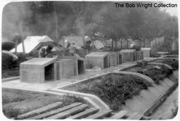 Dhobis lines at Batu Pahat
"Dhobis lines, concrete troughs and slabs for bashing the washing on. Nov. 1941."

1. The photographs are to be known as The Bob Wright Collection.
2. Reproduction of the Collection or any part of it is prohibited without written permission.
3. Permission is granted to the 2/30th Batallion Association to reproduce the Collection as it deems appropriate.
4. Permission is granted to the Australian War Memorial Museum to reproduce the Collection as it deems appropriate.
5. All other permission is specifically withheld.
6. Written application for permission to reproduce the Collection, or part of it, may be made to:
Mr I. Wright
95 Hewitt Avenue
Wahroonga 2076 New South Wales

