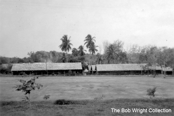 Parade Ground, Batu Pahat
"An old Parade Ground and a few of the huts."

1. The photographs are to be known as The Bob Wright Collection.
2. Reproduction of the Collection or any part of it is prohibited without written permission.
3. Permission is granted to the 2/30th Batallion Association to reproduce the Collection as it deems appropriate.
4. Permission is granted to the Australian War Memorial Museum to reproduce the Collection as it deems appropriate.
5. All other permission is specifically withheld.
6. Written application for permission to reproduce the Collection, or part of it, may be made to:
Mr I. Wright
95 Hewitt Avenue
Wahroonga 2076 New South Wales

