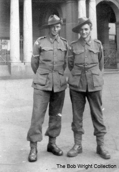 On leave
Left to right:
1) NX36166 - WRIGHT, Robert, Cpl. - HQ Coy. Sig. Pl. 
2) Unknown

1. The photographs are to be known as The Bob Wright Collection.
2. Reproduction of the Collection or any part of it is prohibited without written permission.
3. Permission is granted to the 2/30th Batallion Association to reproduce the Collection as it deems appropriate.
4. Permission is granted to the Australian War Memorial Museum to reproduce the Collection as it deems appropriate.
5. All other permission is specifically withheld.
6. Written application for permission to reproduce the Collection, or part of it, may be made to:
Mr I. Wright
95 Hewitt Avenue
Wahroonga 2076 New South Wales

